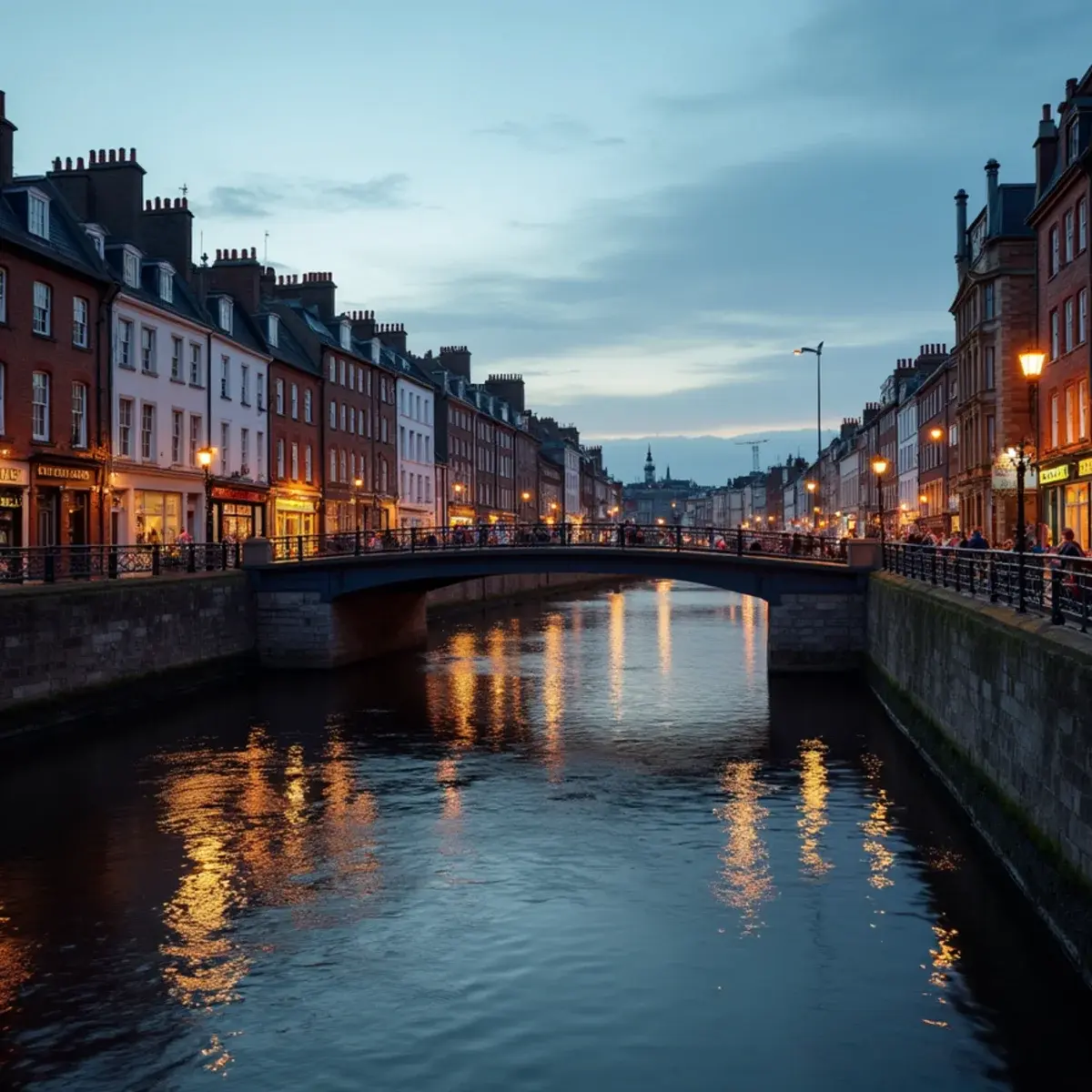 Atlanta to Dublin: Dublin Ha'penny Bridge over the Liffey with Georgian doors and pub fronts, evening